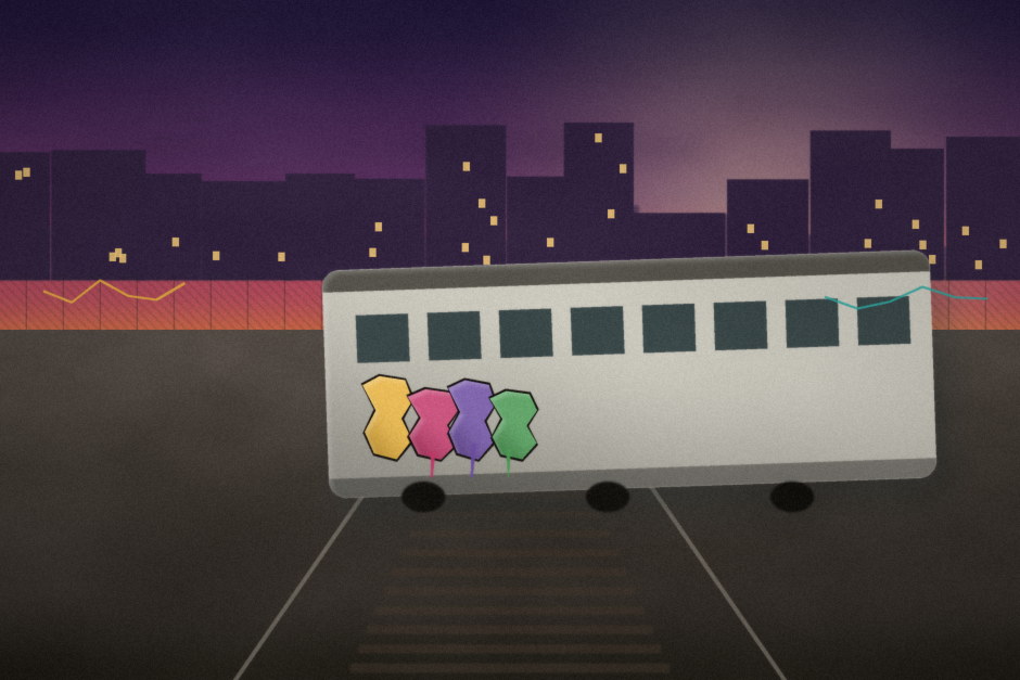 A graffiti-covered subway car at a dusk train yard, city skyline behind it.